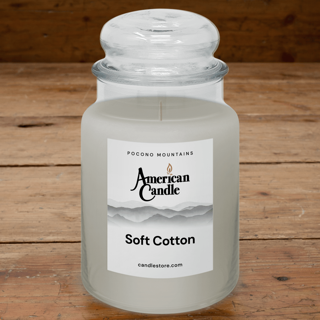 American Candle Soft Cotton Scented Jar Candle on wooden table