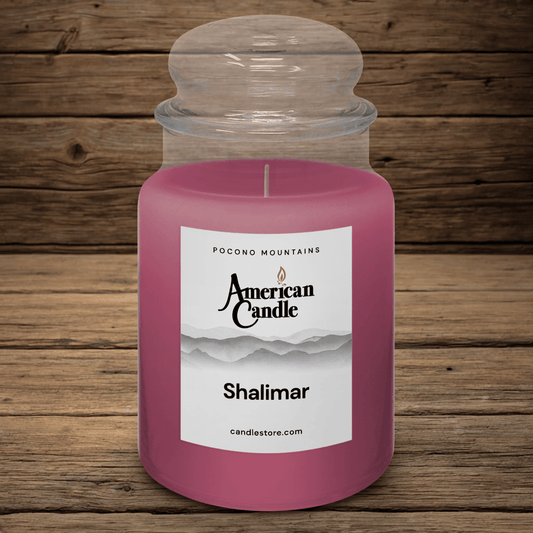 Shalimar Scented Jar Candle by American Candle on Wooden Table