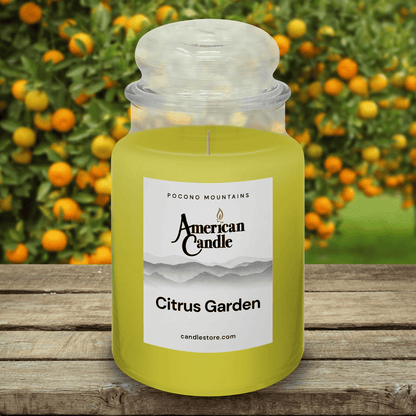 American Candle Citrus Garden Scented Jar Candle on Wooden Table with Citrus Garden in the background