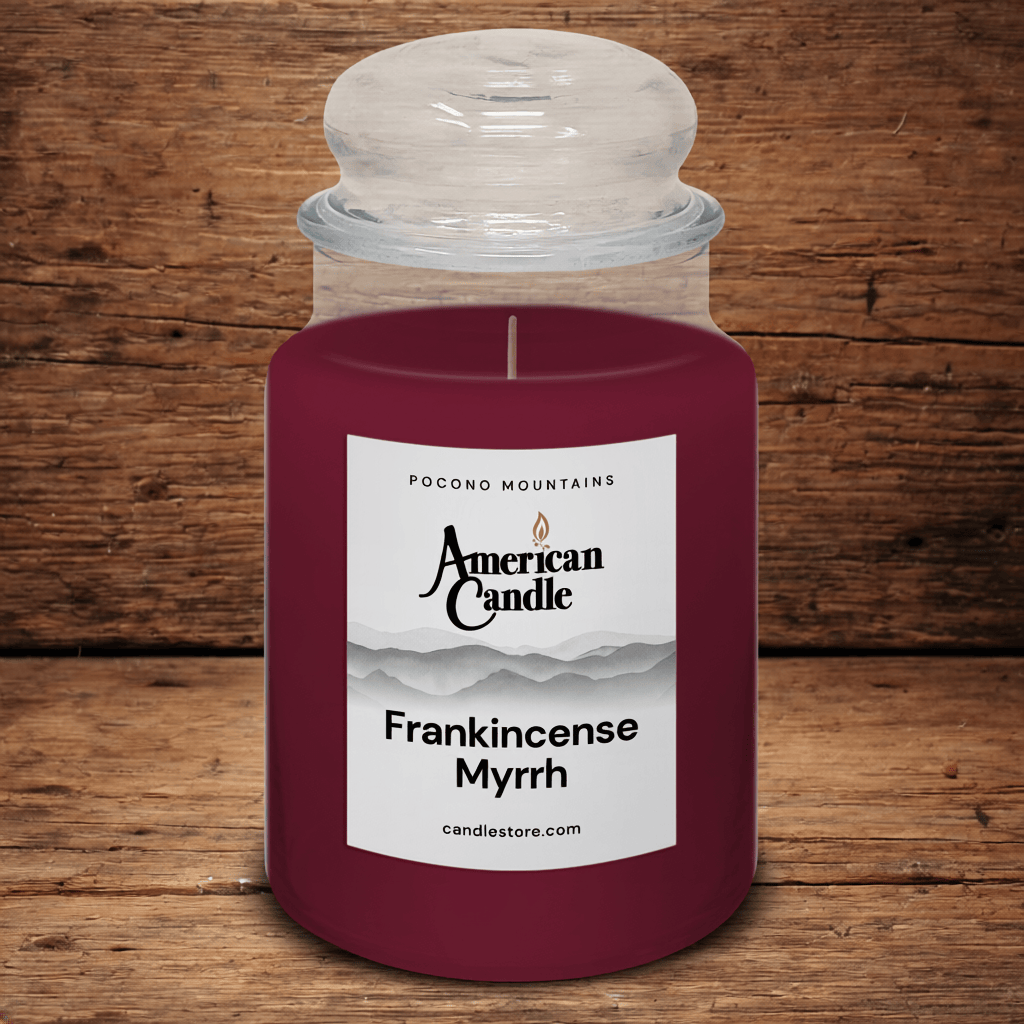 American Candle Frankincense Myrrh scented jar candle on a wooden table