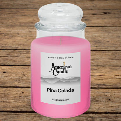 American Candle Pin Colada Scented Jar Candle on old wooded table