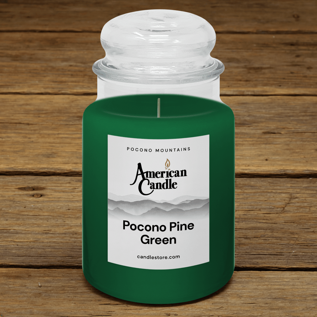 American Candle Pocono Pine Green Scented Jar Candle on a Wooden Table