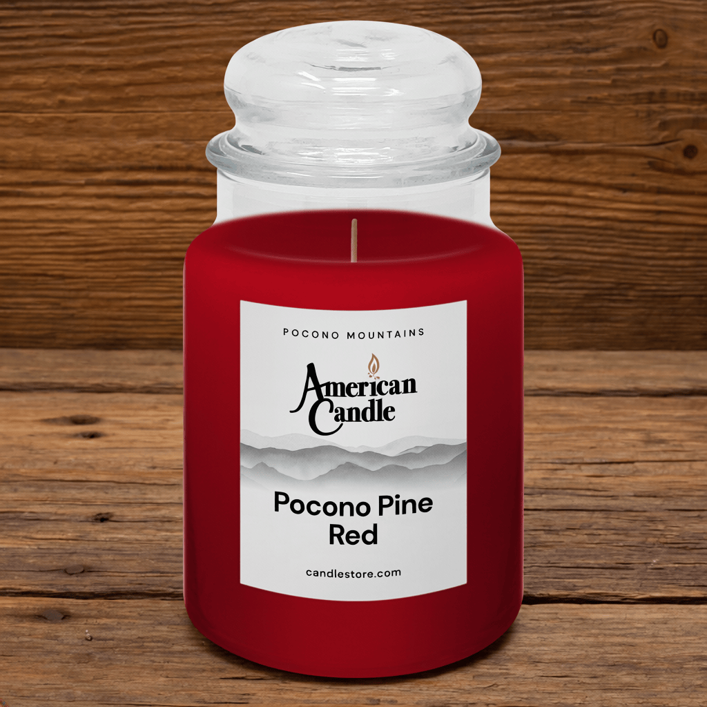American Candle Pocono Pine Red Scented Jar Candle on a Wooden Table