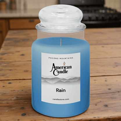American Candle Rain Jar Scented Candle on Wooded Table