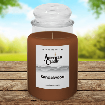 American Candle Sandalwood Scented Jar Candle on a Wooden Table during a Sunny Summer Day