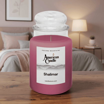 American Candle Shalimar Scented Jar Candle on a Wooden Table  in the Bedroom