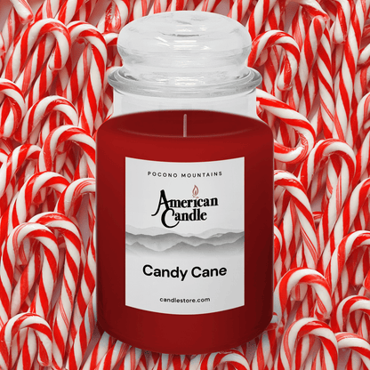 American Candle Candy Candle Jar Scented candle surrounded by candy canes