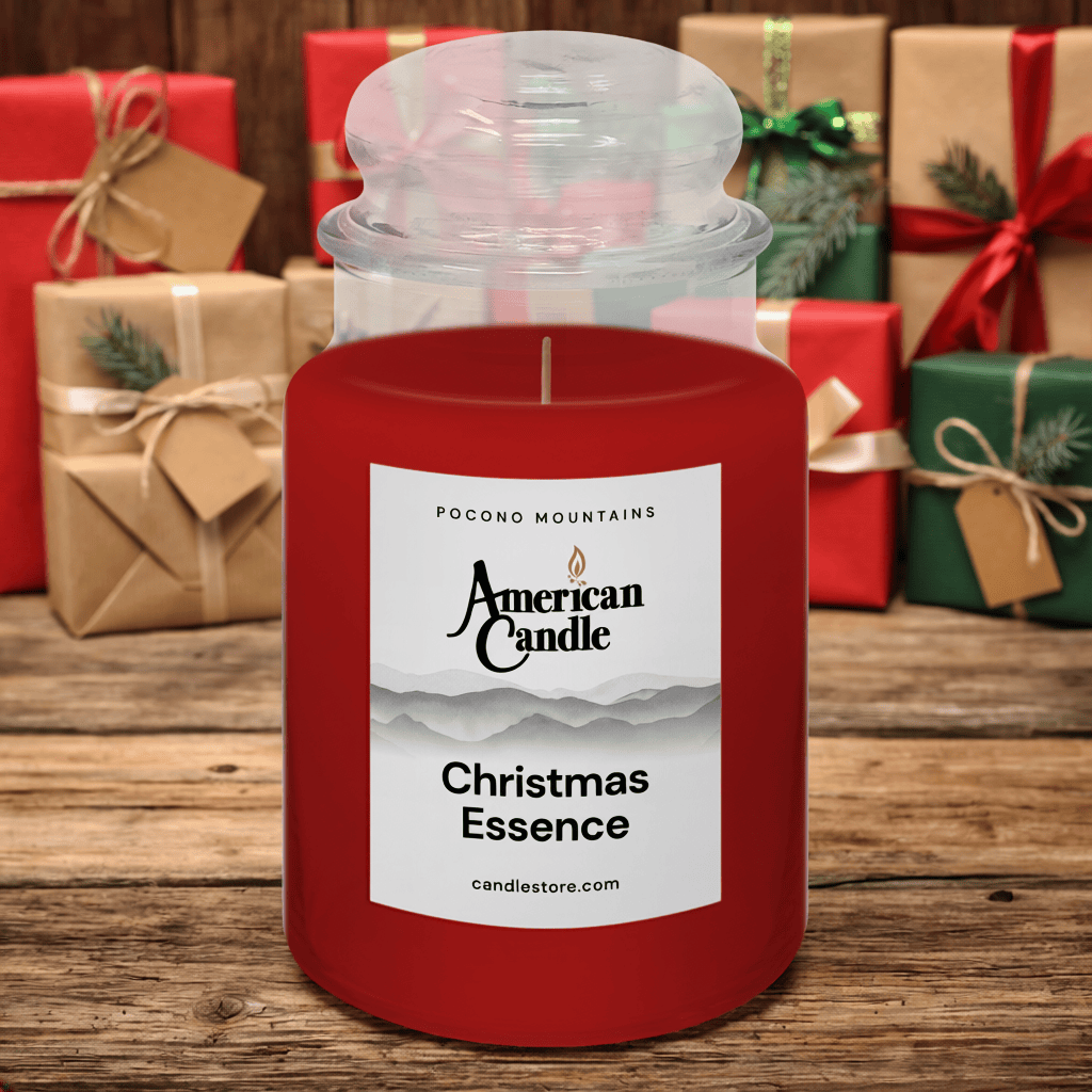 American Candle Christmas Essence Scented Jar Candle with holidays gift boxes in the background on wooded table