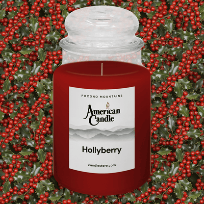 American Candle Hollyberry Scented Jar Candle against a background of holly leaves and berries.