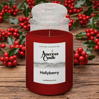 American Candle Hollyberry scented Jar Candle with holly leaves and berries on a wooden background